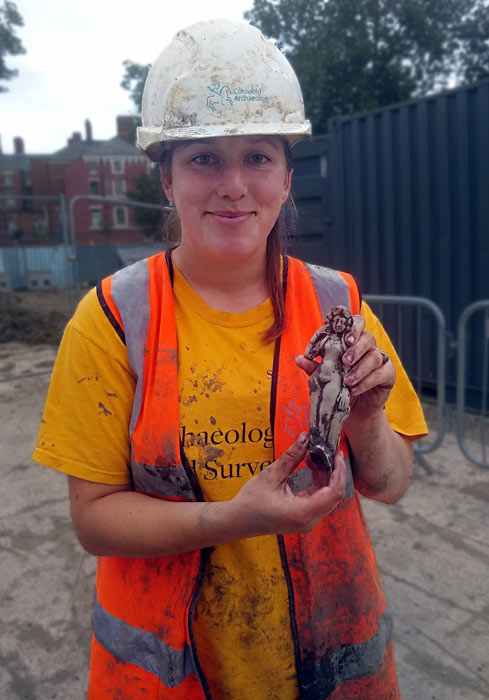 The Roman Venus figurine just after it was found in the hands of a Cotswold Archaeology team member. (Cotswold Archaeology)