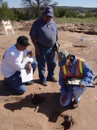 Zuni elders Octavius Seowtewa and John Bowannie, and archaeologist Sarah Herr, look at a shrine archaeologists misidentified. Chip Colwell, Author provided