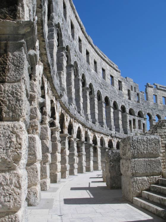 Restored arched walls at Pula.