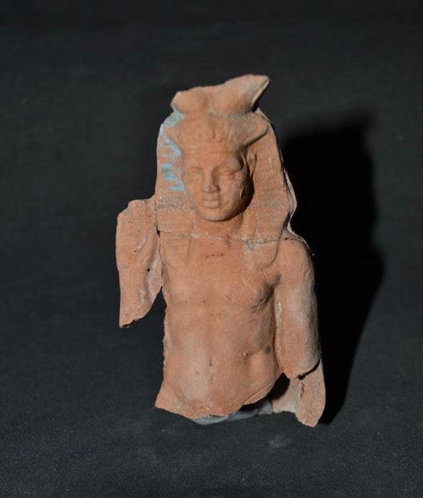 The badly damaged remains of a statue of Harpocrates, the Greek god of silence, secrets, confidentiality, and hope, was also found at the Greek pottery workshop site as well as other religious or spiritual items. (Ministry of Tourism and Antiquities)