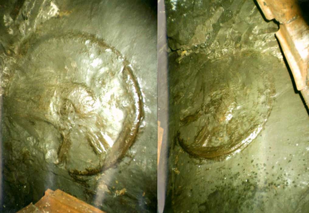 Two photos of the ancient wheel.