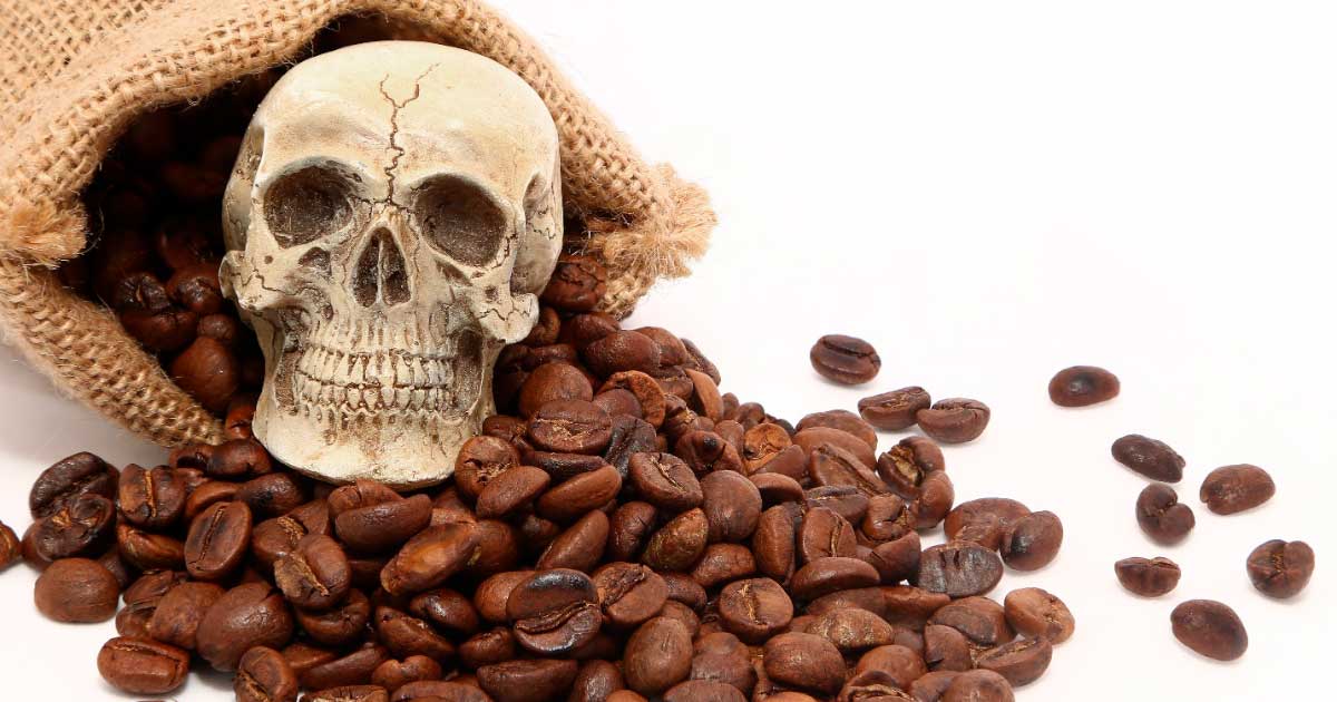 Coffee beans next to a skull. Source: karnstocks / Adobe Stock