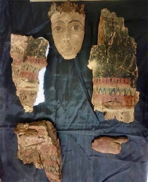 Parts from the woman’s burial include a mask, coffin and chest fragments. Source: Ministry of Tourism and Antiquities.