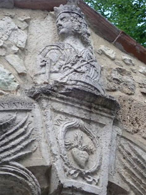 The heart in flames on Rivodutri’s Alchemical Door (LatiumMirabile / Atlas Obscura)