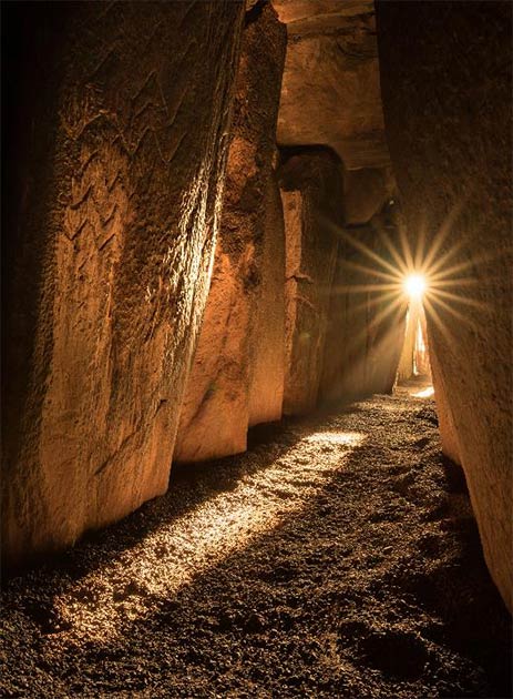 Sunlight inside Newgrange on the solstice. Credit: Ken Williams, shadowsandstone.com