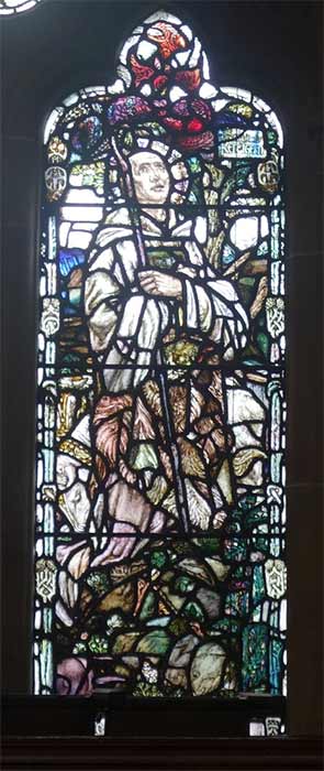 Stained glass in the University of Glasgow illustrating the legendary Saint Mungo. (