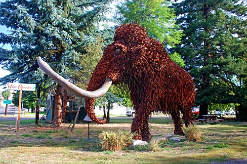 A modern sculpture of a woolly mammoth in Oregon illustrates one of the giant Ice Age mammals that sustained many of North America's earliest hunter-gatherers. Mammoths provided meat, fat, hides, bone, and ivory, making them among the continent's most valuable prehistoric resources