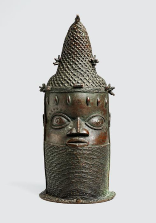 The Iy’Ọba (Queen Mother) represented in a bronze container.