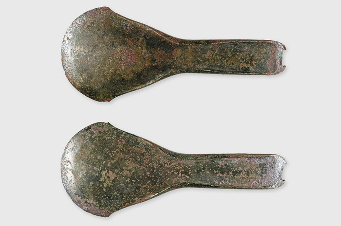 The Bronze axe, front and back views.