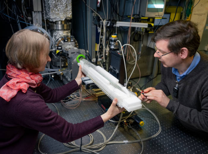 Researchers positioning the sword for measurement at the BAMline at BESSY II. 