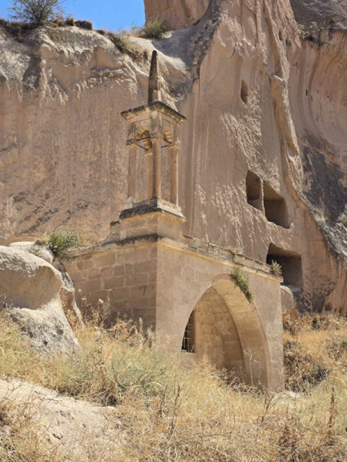 Ancient rock-cut church facade in Cappadocia