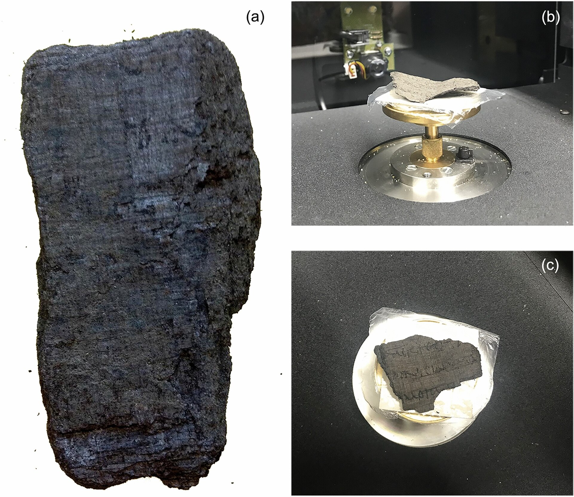 Carbonized Herculaneum papyrus fragment before and during high-resolution X-ray tomography scanning used for virtual unrolling and AI-assisted text recovery