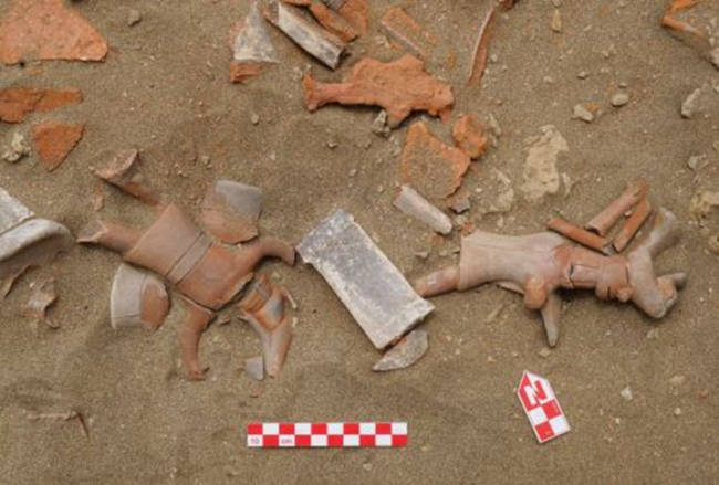 Ceremonial vessels and warrior figures.