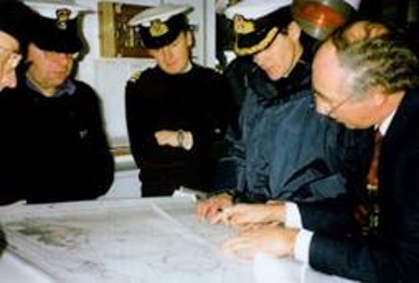 Ian Archibald and Commander Bob Stewart during an early search aboard HMS Roebuck.