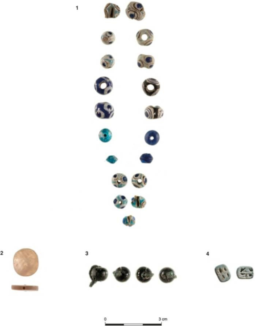 A collection of beads, possible funerary offerings, which were found in the cistern 