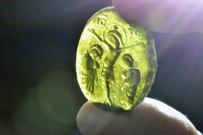 Jewel with the cricified Christ and Mary and John.