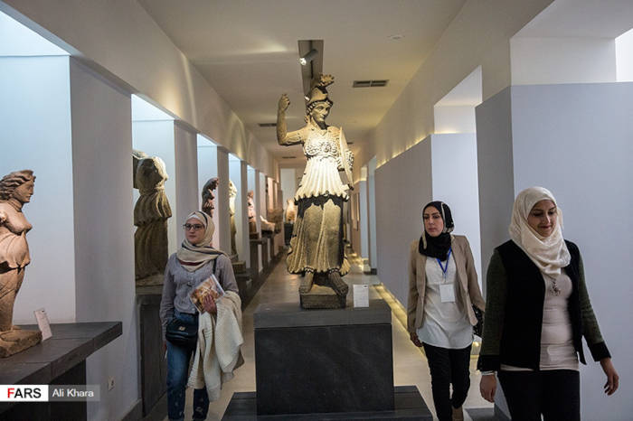 Visitors in an exhibit hall in 2018.