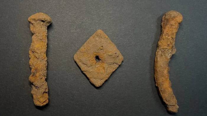 Metal ship rivets reported from the area near the mound