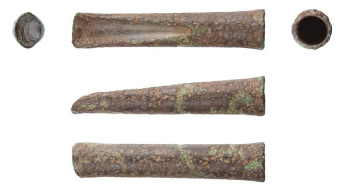 Bronze woodworking gouge showing cutting edge and socket