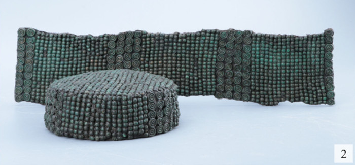The belt and cap after completion of the conservation work.