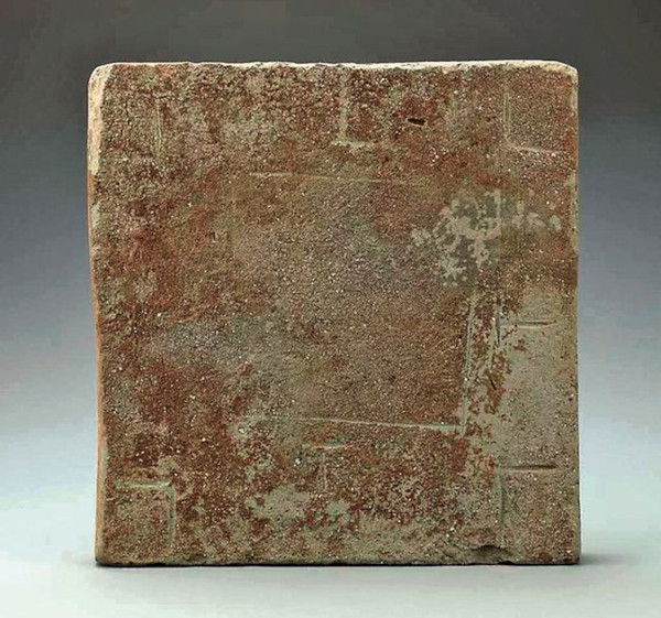 One of two Liubo game boards carved into square bricks and recovered from Han Dynasty tombs at Shaanxi 