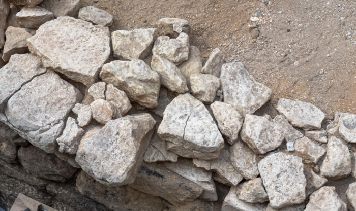 Fire cracked stones of the Iron Age wall