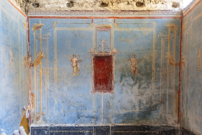 Frescoes on the blue depict female figures believed to represent the four seasons