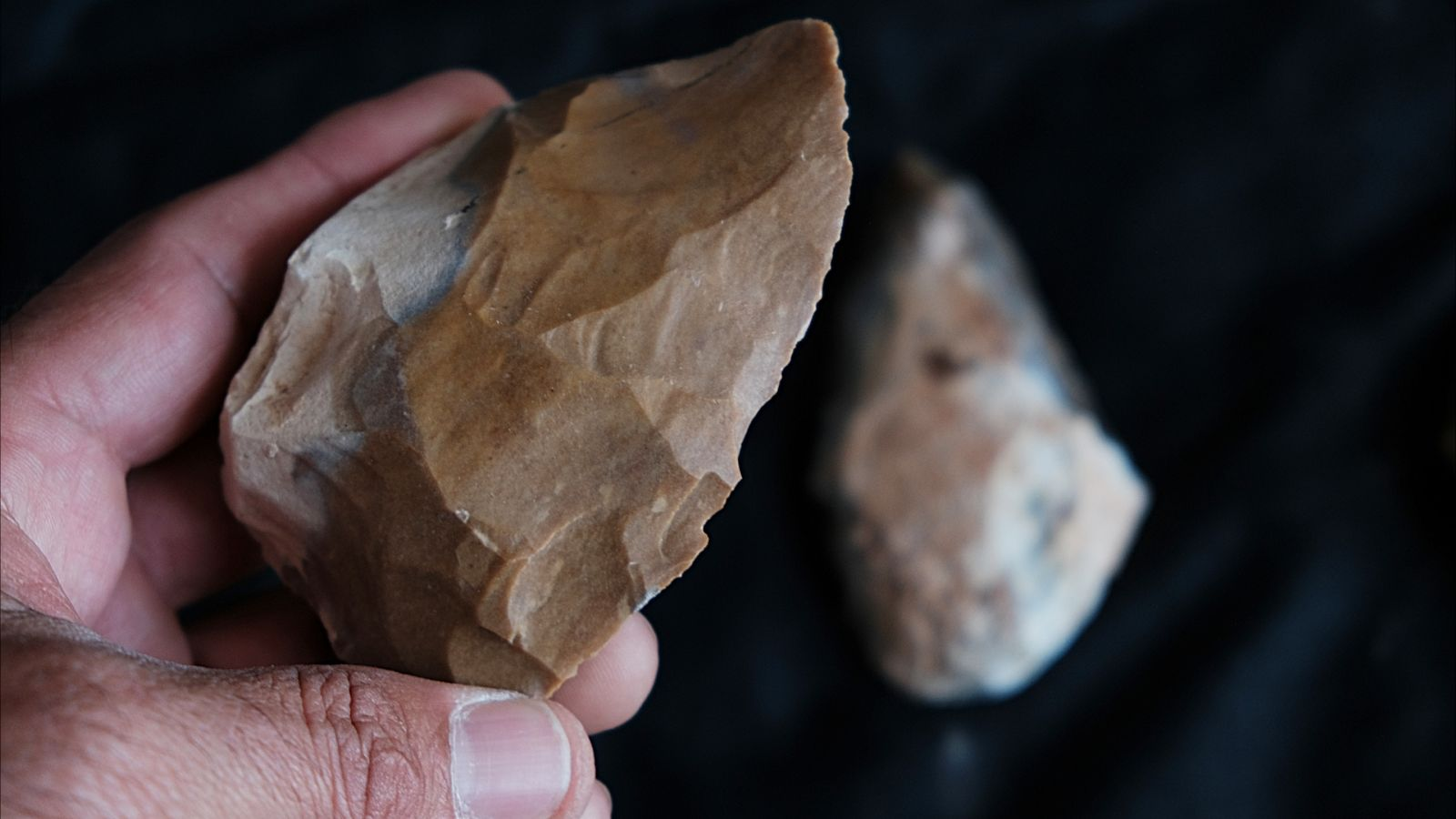 Prehistoric flint hand stone discovered in the approximately 300,000-year-old Fureidis Cave excavation, Israel