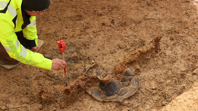 Remains of a two-wheeled wagon being excavated at the Bad Camberg site