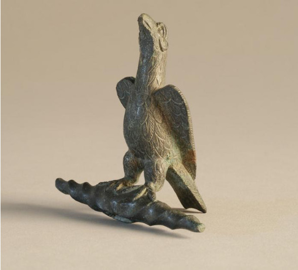 Bronze statuette of an eagle standing on a lightning bolt