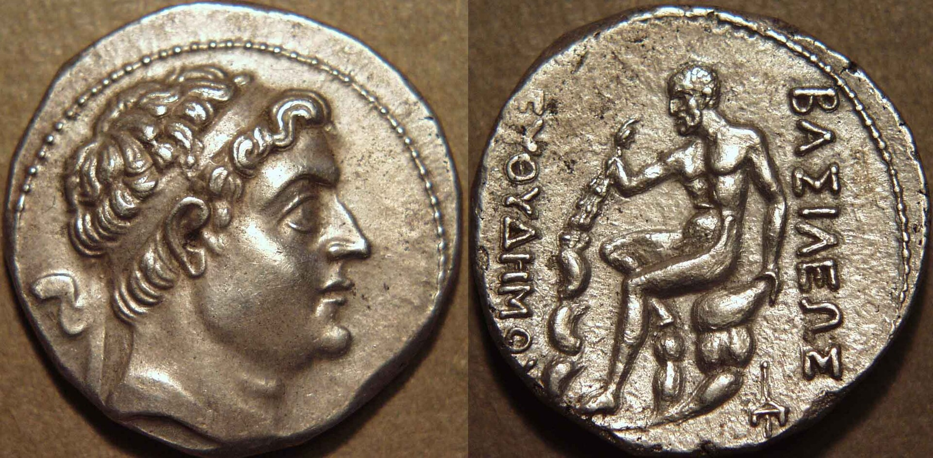 Silver tetradrachm of Demetrius I Soter, Seleucid king, with Heracles seated on the reverse