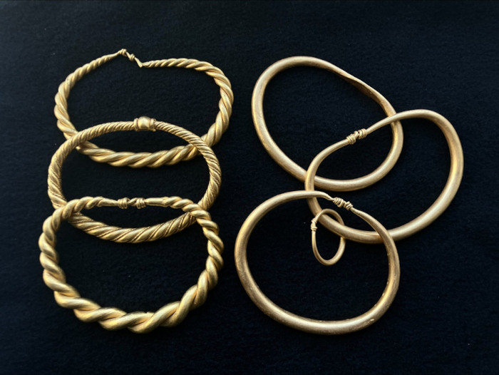 The six gold arm rings that make up the Rold Viking hoard.