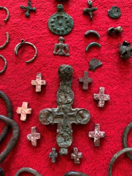 Religious crossses and ornaments from the site