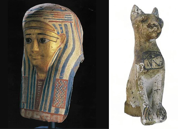 Mummy mask and cat sculpture