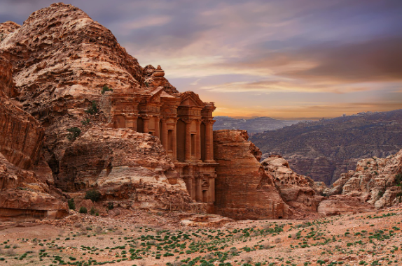 The colossal rock-cut Ad Deir Monastery facade in Petra, Jordan