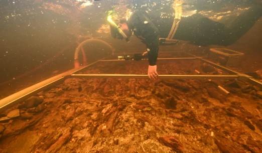 The researchers found the remains of a large wooden platform under the crannog