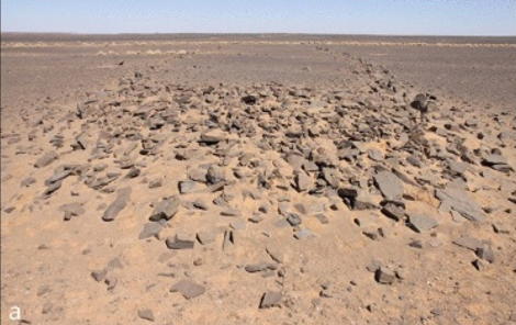 The funerary monument, with tumulus in the foreground and ‘antennae’.