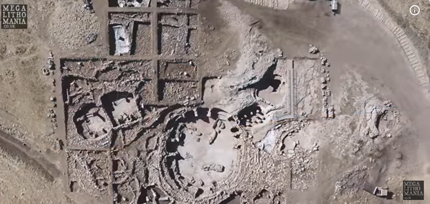 An aerial view of a ruined area
AI-generated content may be incorrect.