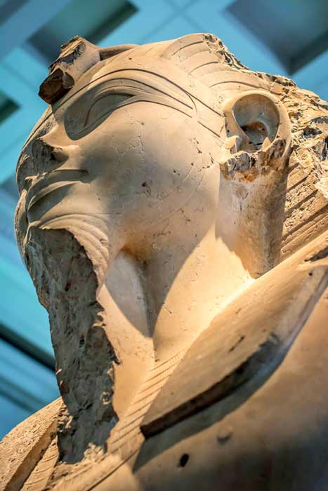 This limestone statue of Amenhotep III originally stood within his mortuary temple in western Thebes.