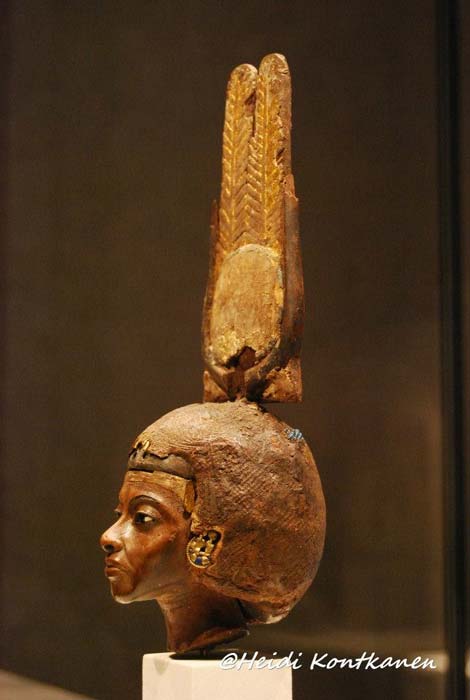 Head of a statuette of Queen Tiye, wearing a double-feathered crown, made of yew wood with silver, gold and glass. Neues Museum, Berlin