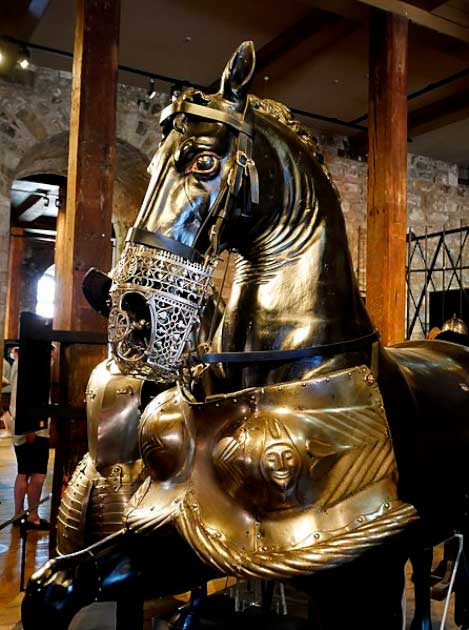 Not long after its construction in the Middle Ages, the Tower of London became the principal official manufactory of armor for the Kings of England, and their trusty steeds. Here we see some model horses in armor at the White Tower in the Tower of London. (Ethan Doyle White / CC BY-SA 4.0)