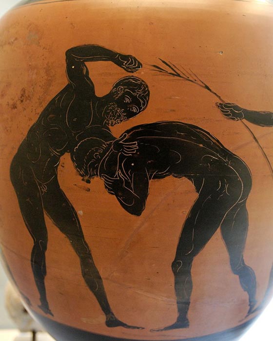 Two athletes competing in the pankration. Panathenaic amphora, made in Athens. 