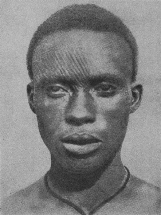 A picture of an Igbo man with facial scarifications, known as Ichi, taken in the early 20th century. (Public domain)