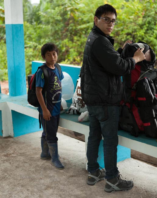 Our 7-year-old ‘guide’ Miguel, and Chris Aguilar preparing to leave for the forest
