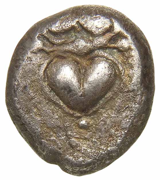Ancient silver coin from Cyrene depicting a heart-shaped seed/fruit of silphium. (Public Domain)