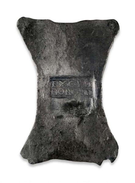 An officially stamped Roman British silver bar, produced between the 4th and 5th centuries AD, weighing 353 grams (0.78 pounds).  The stamped inscription reads EX OFFE HONORINI, which translates "from the workshop of Honorinus." It was found in 1777 along with two gold coins from Emperor Arcadius and one from Honorius, and dates from the late Roman period in Britain.  (© Trustees of the British Museum)
