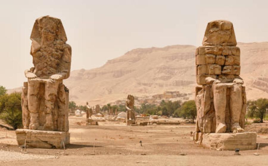 Colossi of Memnon (statues of Pharaoh Amenhotep III), Luxor, Egypt.  