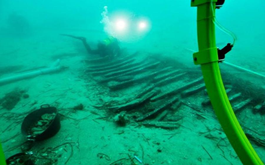 : Archaeologists working on the remains of the Iberian wreck Cala Cativa I.