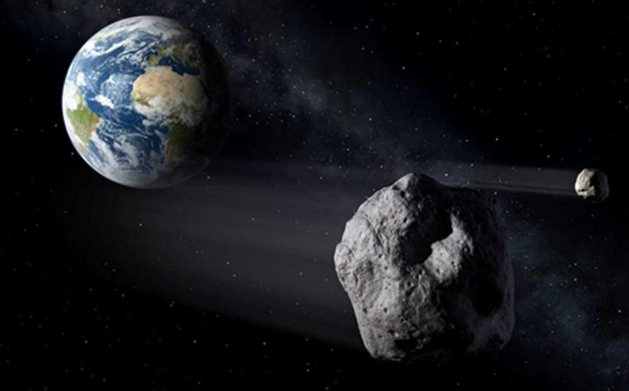 An illustration of a near-Earth object, or NEO, passing by Earth.
