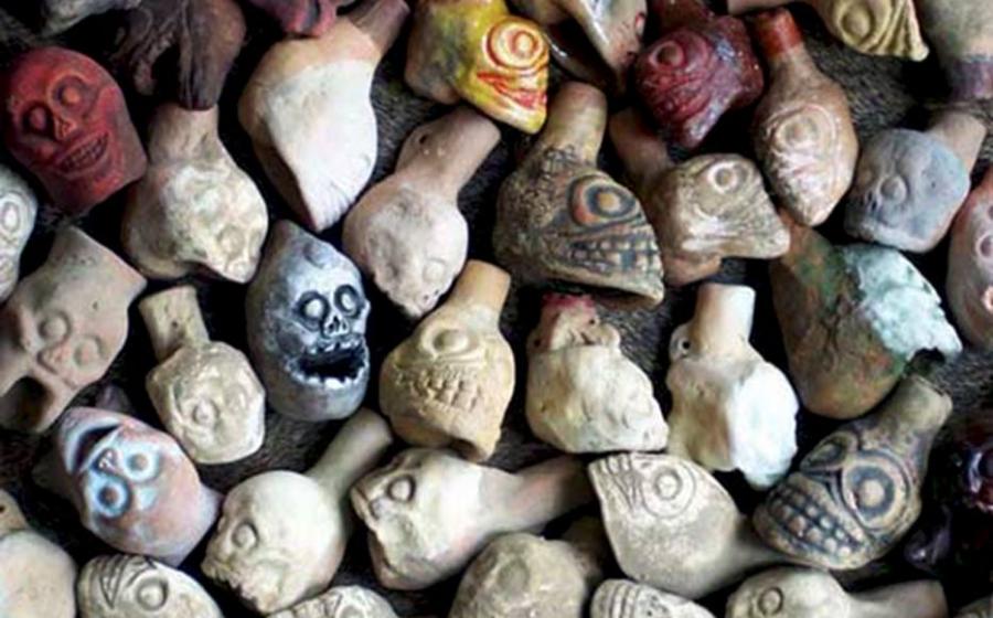 Experimental models of Aztec death whistles